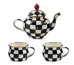 three pieces of black and white checkered tea set