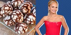 a woman standing next to a plate of cookies