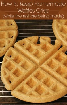 three waffles sitting on top of a cooling rack with text overlay reading how to keep homemade waffles crisp while the rest are being made