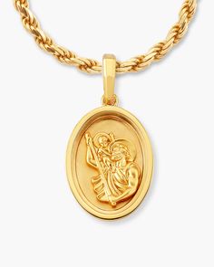 Show off your style and spirituality with our gold St. Christopher Pendant. As the patron saint of travelers, adventurers and wanderers alike will love the Saint Christopher Pendant. Pair with our gold Rope Chain for a bold fit.