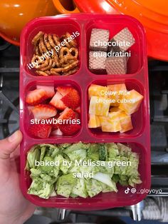 a plastic container filled with different types of food and words on the inside of it