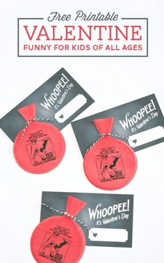 two red frisbees with tags attached to them that say, free printable valentine funny for kids of all ages