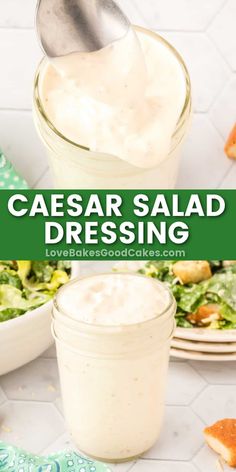 homemade caesar salad dressing in a mason jar with a spoon on the side and another bowl full of salad behind it