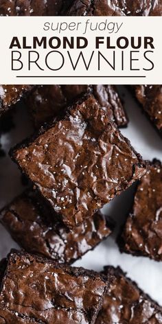 chocolate brownies stacked on top of each other with the words super fudgey almond flour