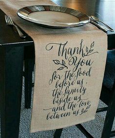 a table with a place mat that says, thank you for the food we have served