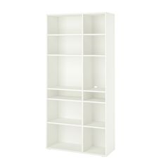 a white bookcase with four shelves on each side