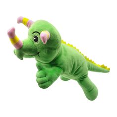 a green stuffed animal with yellow horns and pink ears is flying through the air in front of a white background