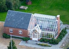 an aerial view of a house with a glass roof