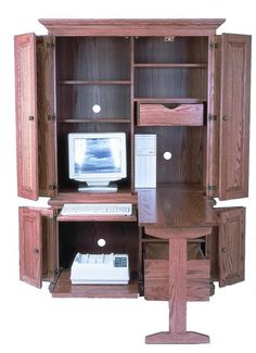 a computer desk with drawers and a monitor