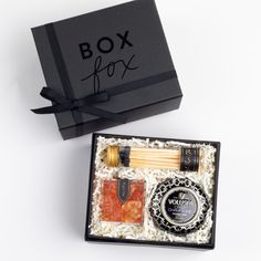 BLACK BOXFOX BOX displayed open with: Champagne Bears, Crisp Champagne Mini Tin Candle, and Black Match Jar Box Fox, Champagne Toast, Corporate Gifts, Simple Way, Matte Black, The Year, Champagne, Toast, Personalized Gifts