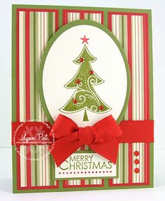 a christmas card with a red bow on the front and green, white, and red background