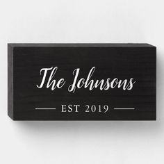 a black and white sign that says the johnsons est 2019