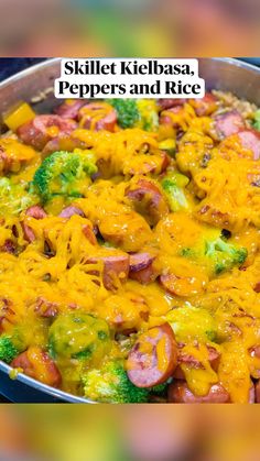 broccoli and sausage casserole in a pan with yellow cheese on top