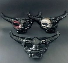 Experience the essence of strength and magnificence with our captivating bull mask adorned with striking bull horns. Step into the world of these majestic creatures, exuding their fearless spirit and commanding presence. This mask is the perfect addition to any masquerade outfit or Halloween costume! Age Group/Gender - Adult/Men Size/Type - One size fits all adults Mask Color - Black with colored eye Mask Material - Polyresin Black Horned Masquerade Mask, Black Horned Mask For Masquerade, Masquerade Dance, Mardi Gras Kid, Elegant Face Mask, Black Masquerade Mask, Masquerade Ball Party, Mens Masquerade Mask, Blank Mask