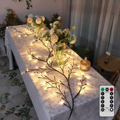 PRICES MAY VARY. Includes: H-Wniniai vine length of about 6.5 ft, 18 branches, each 1.3ft with 8 LED warm white light, total 144 LED, with a 196-inch power cord and USB port. 8 Lighting Modes + Timing Remote Control: You can use the remote control to achieve the desired effect. Eight lighting modes are available (Combination/ In Wave/ Sequential/ Slo Glo/ Flash/ Slow Fade/ Twinkle/ Steady). One-touch 6H timing, the light will automatically turn on at the same time every day. Fine design& Brightn Backyard Dinner Table, Sweet 16 Purple Theme, Decorating With Fairy Lights, December Graduation, Dinner Party Lighting, Enchanted Forest Classroom, Fall Table Decor Ideas, Twig Garland, Wave Splash