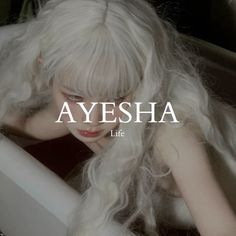 a woman with long white hair sitting in a bath tub next to the words ayesha