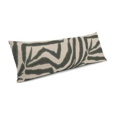 a zebra print pillow on a white background