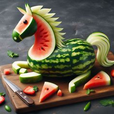 a horse made out of watermelon sitting on top of a wooden cutting board