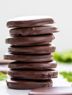 chocolate covered cookies stacked on top of each other