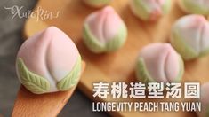 a spoon with some food on it and the words longevity peach tang yuan written in chinese