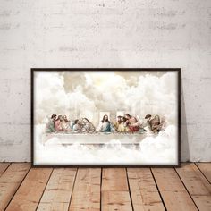 the last supper painting in a frame on a wooden floor