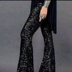 Black Hi-Waist Sequin Flare Leg Trousers Knitted Fabric 95% Polyester 5% Elastane Black Full-length Pants For Night Out, Black Full Length Pants For Night Out, Glamorous Fitted Black Bottoms, Trendy Stretch Bottoms With Sequins, Trendy Stretch Sequined Bottoms, Non-stretch Trousers For Night Out, Black Stretch Pants For Evening, Casual Black Pants For Party, Glamorous Black Fitted Pants