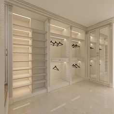 an empty walk in closet filled with lots of white shelves