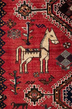 an old rug with a horse on it