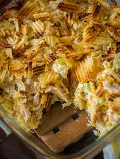 a casserole dish filled with chicken and cheese