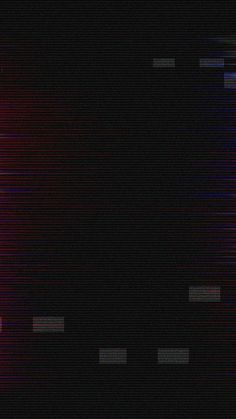 a black background with red and blue lines in the center that appear to be blurry