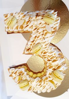 the number three is decorated with bananas and cream