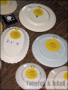 white and yellow plates with tags on them