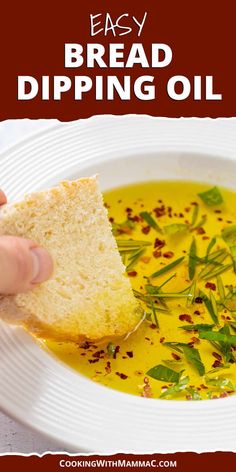 a hand dipping bread into a bowl of soup with herbs on top and text overlay reading easy bread dipping oil