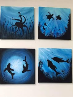 four paintings of sea animals in blue and black