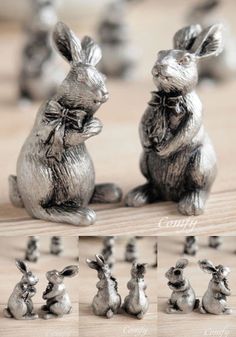 two metal rabbits sitting next to each other