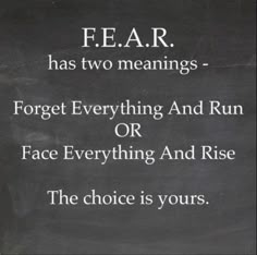 a sign that says fear has two meaningss forget everything and run or face everything and rise the choice is yours