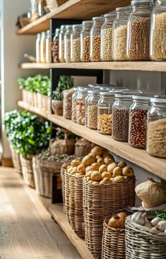 the shelves are filled with different types of food and vegetables in glass jars on wooden shelves