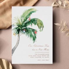 a palm tree is shown on top of a card