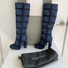 100% Authentic Guaranteed! Tom Ford Put An Ultra Chic Update On Casual Denim For Fall '15, Incorporating The Fabric Into His Collection In Unexpected Ways. We Especially Love These Knee-High Runway Boots, Finished With Black Leathertrims That Create A Caged Patchwork Design. This Pair Looks Chic With Everything From High Hemlines To Midi Skirts. Heel Measures Approximately 115mm/ 4.5 Inches - Mid-Blue Denim And Black Leather - Zip Fastening Along Side Condition: Brand-New! Come With Original Box & Dust Bag. Size: 36.5 All My Items Are Authentic! These Boots Are From Tom Ford Fall/Winter 2015 Collection And Retail For $2690 Plus Tax, Coming Up To $2930. Sold Out Everywhere! Seen On Many Tom Ford Shoes, Denim Boots, Midi Skirts, Looks Chic, Patchwork Designs, Casual Denim, Shoes Heels Boots, Tom Ford, Riding Boots