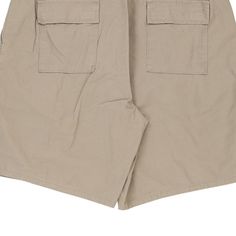 Vintage Dockers beige cargo shorts, fit a 37" waist and 9" inseam. WAIST: 37 inches / 94cmsINSEAM: 9 inches / 23cmsRISE: 13 inches / 33cmsGENDER: mens CONDITION: good - small mark on front left leg and back right leg.STYLE: cargo shortsERA: 1990sCOLOUR: beigeFABRIC: cotton Beige Cargo Shorts, Beige Cargo, Shorts Fit, Style Cargo, Cargo Shorts