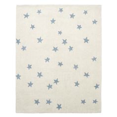 a white rug with blue stars on it