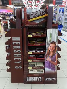 hershey's display in a store with chocolates and candy bars on it