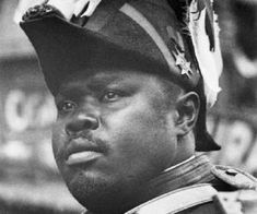 a black and white photo of a man in uniform