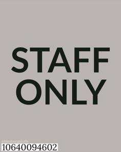 the words staff only are in black on a gray background