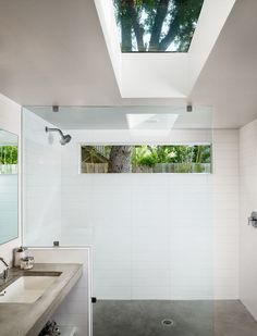 the bathroom is clean and ready to be used as a bathtub or shower stall