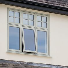 an open window on the side of a building