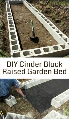 the cinder block raised garden bed is being worked on by a man with a shovel