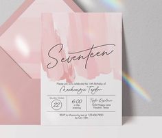 a pink and white wedding card with the word, sevenpenn on it