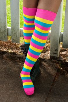 Made in the USA. Bold striped socks with plenty of stretch, so you can show off your true colors with pride. We're so proud of how vibrant these stripes are, and we're just as proud of you for staying true to yourself! Trendy Multicolor Thigh High Stockings, Fun Multicolor Stretch Socks, Playful Multicolor Knee-high Socks, Stretchy Multicolor Trendy Knee-high Socks, Multicolor Stretch Knee-high Socks, Stretch Multicolor Knee-high Socks, Trendy Multicolor Stretch Knee-high Socks, Multicolor Stretch Thigh High Socks, Stretch Multicolor Thigh High Socks