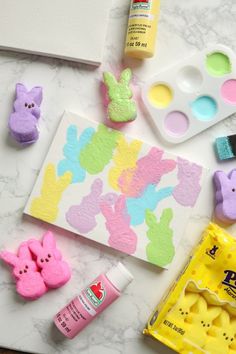 the supplies needed to make this diy easter bunny craft are laid out on a marble surface